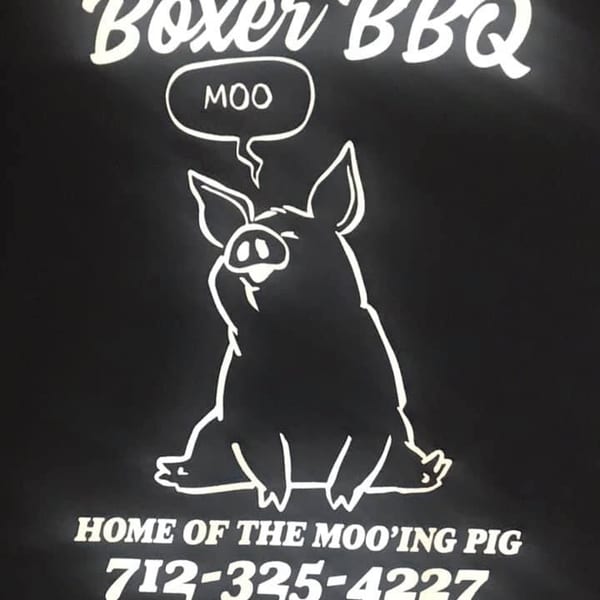 Boxer BBQ logo with a pig saying "MOO" and the text "Home of the Moo'ing Pig".