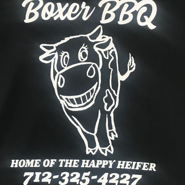 Boxer BBQ logo with a smiling cartoon cow and the text "Home of the Happy Heifer".