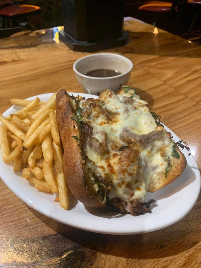 Au Jus Kidding Me Prime Rib Melt Sandwich.